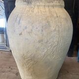 Yellow patinated cement grain jar