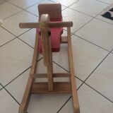 Rocking horse of the 70's in light wood