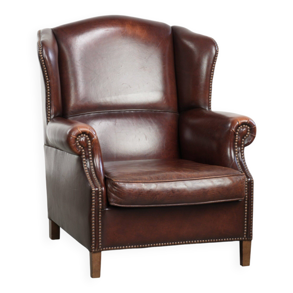 Fauteuil à oreilles en peau de mouton vintage au style anglais intemporel
