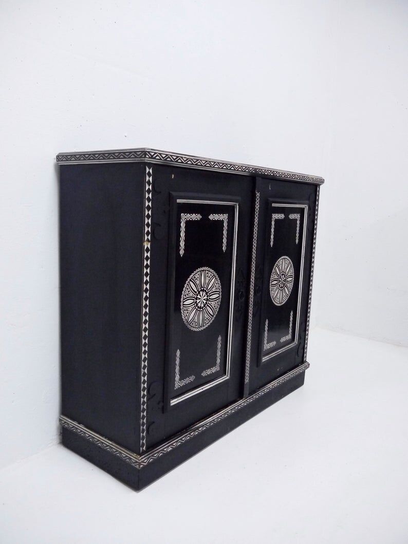 Antique wooden cabinet painted in black and with incised white painted decorations, Ettore Zaccari, Italy c 1910