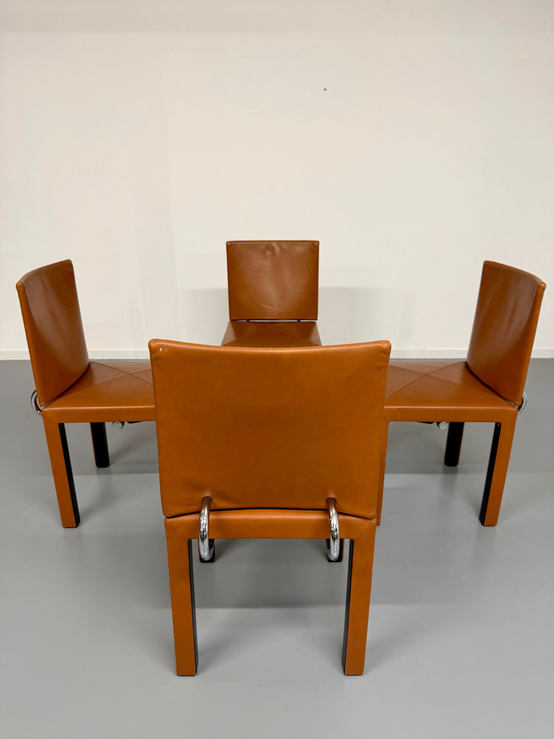 4 camel leather chairs, postmodern design by Paolo Piva for B&B Italia Arcadia.