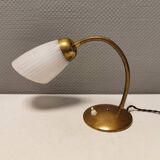 Beautiful table lamp, estimated from the 1950-60s. Made of metal, brass and glass.