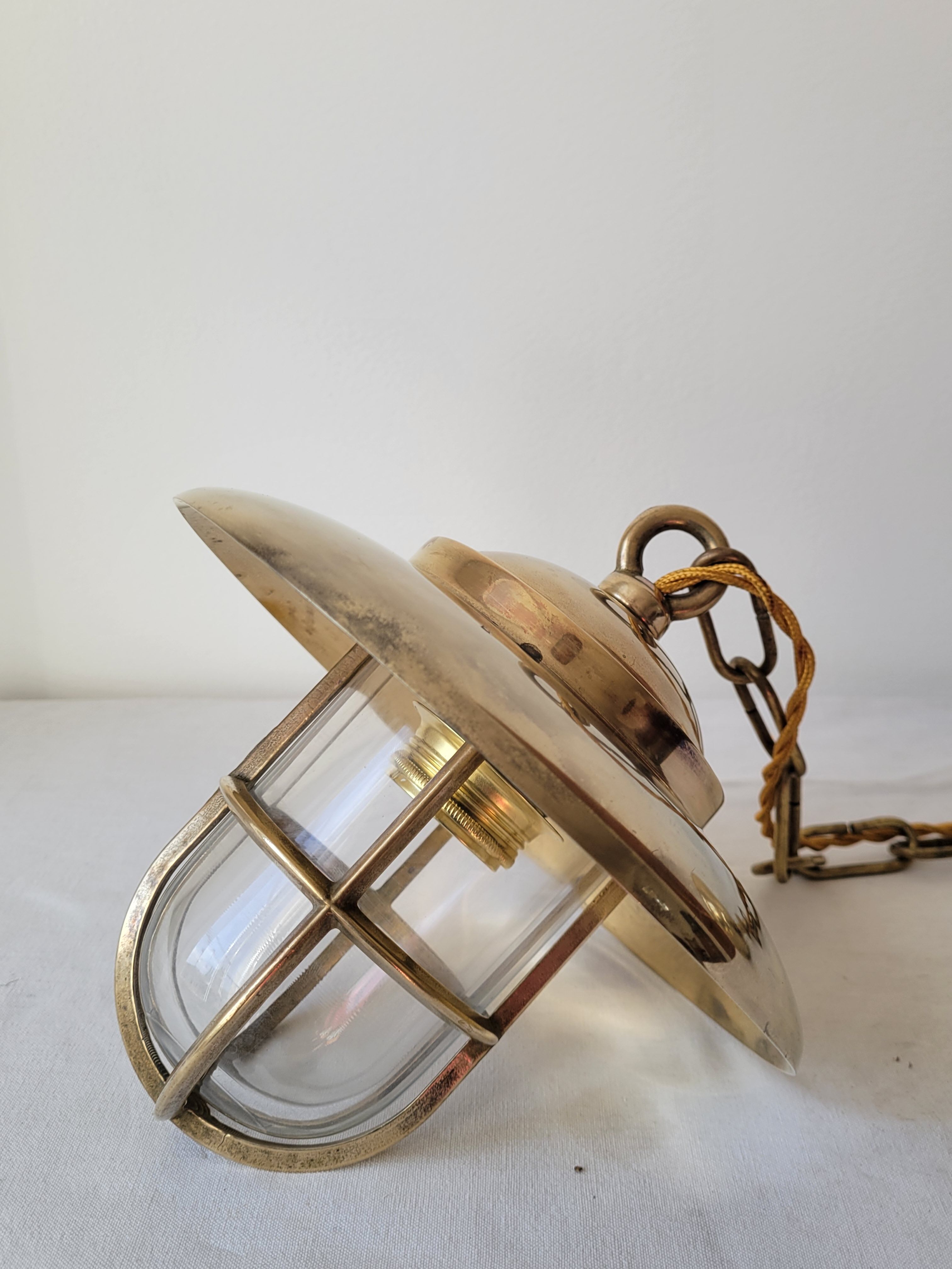 Marine suspension in brass and glass