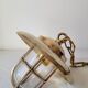 Marine suspension in brass and glass
