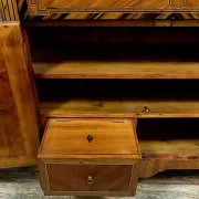 Secretary from the Louis XVI era in precious wood marquetry.