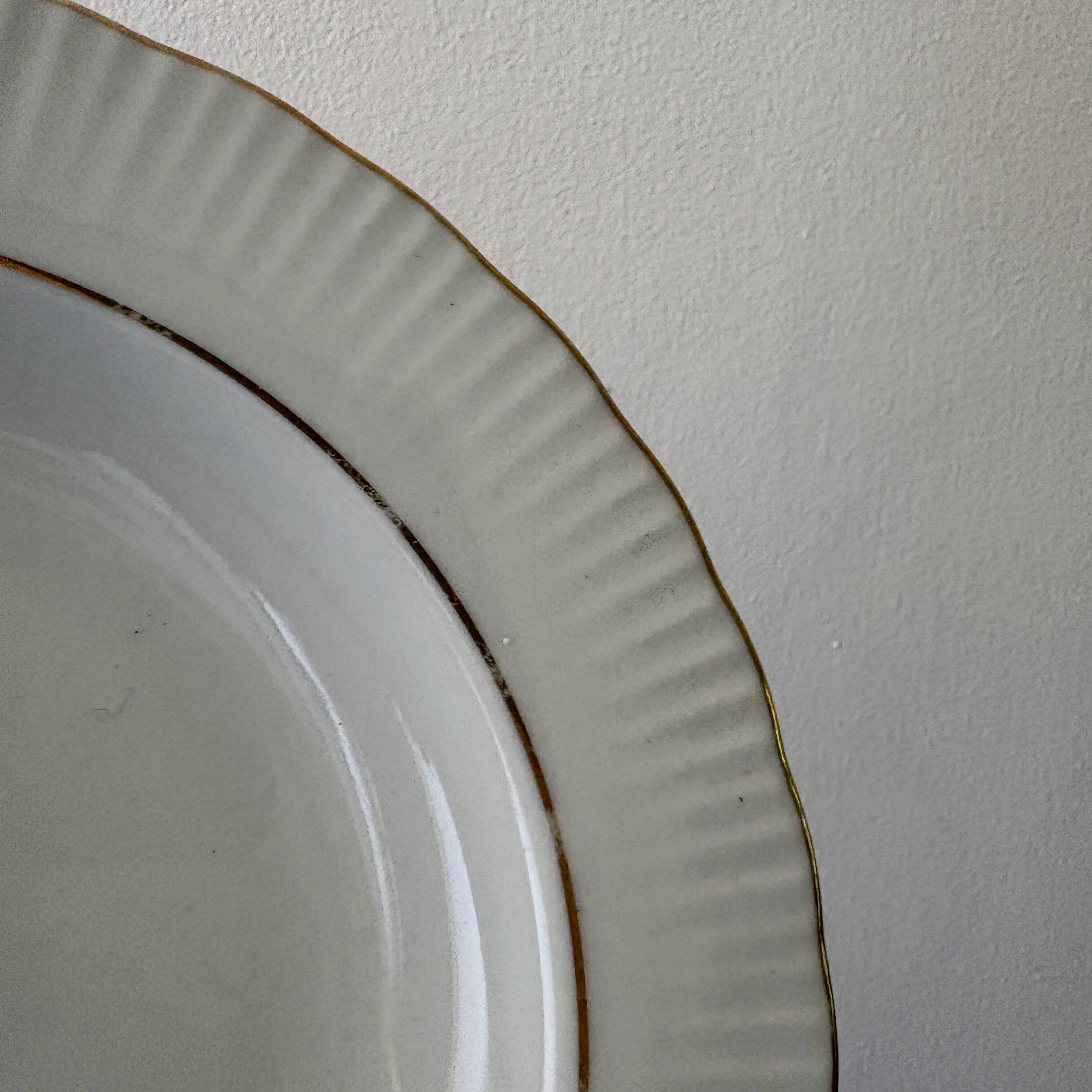 Set of 8 vintage deep plates in German porcelain.