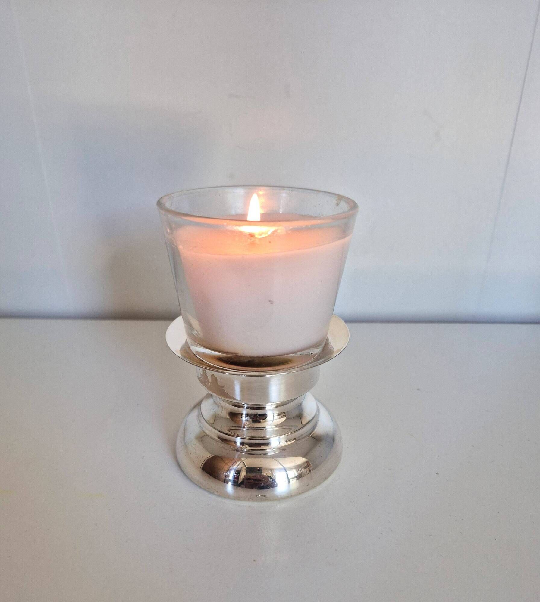 Antique silver candle holder.