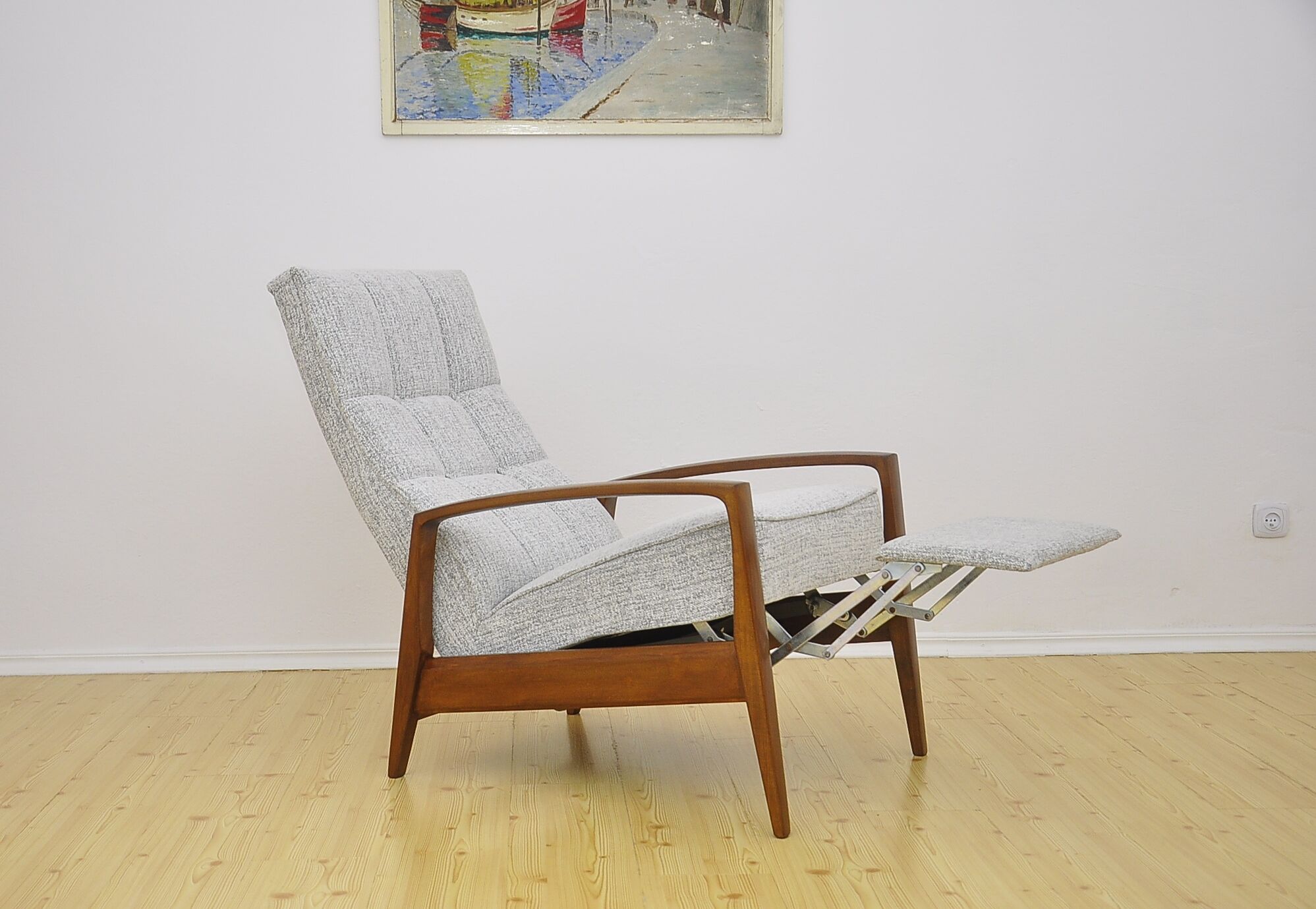 Mid-century armchair with folding footrest, 1960s