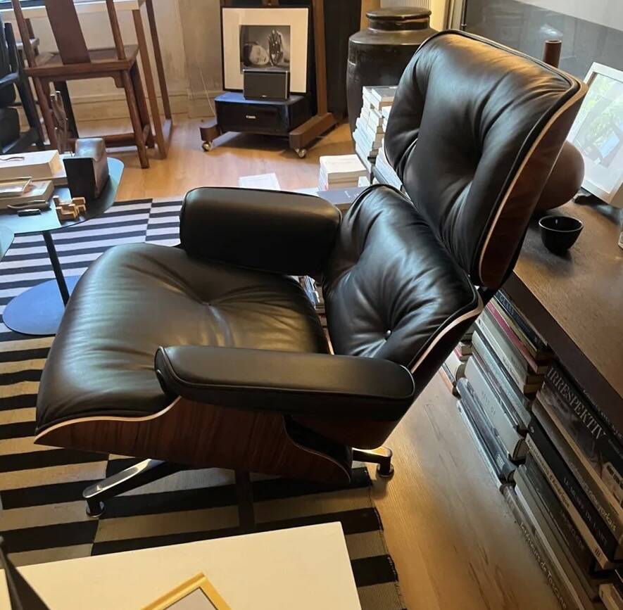 Lounge chair and ottoman by Charles Eames