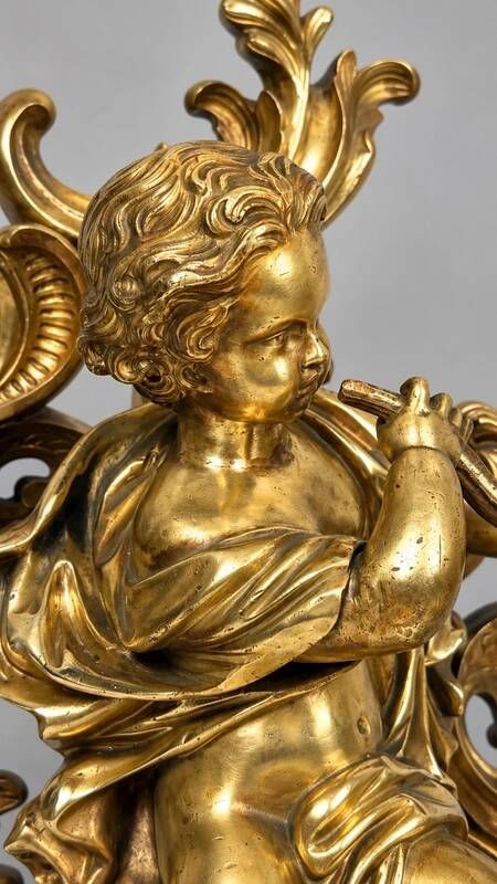 Pair of gilded bronze fire dogs Louis XV, musician putti