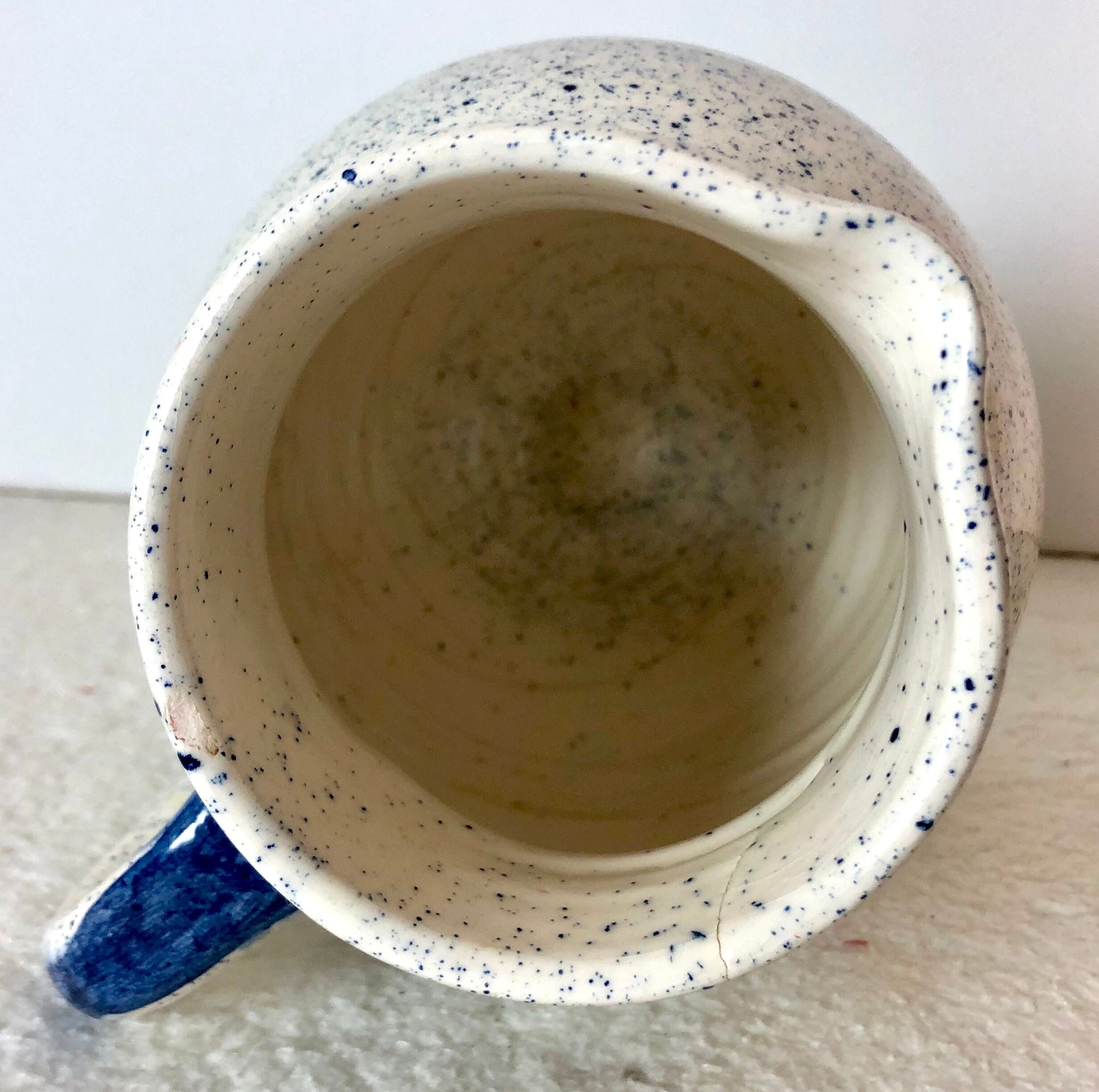 Speckled ceramic pitcher
