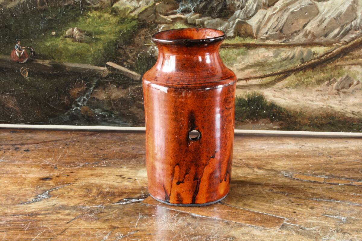 Signed orange ceramic candle holder and jug
