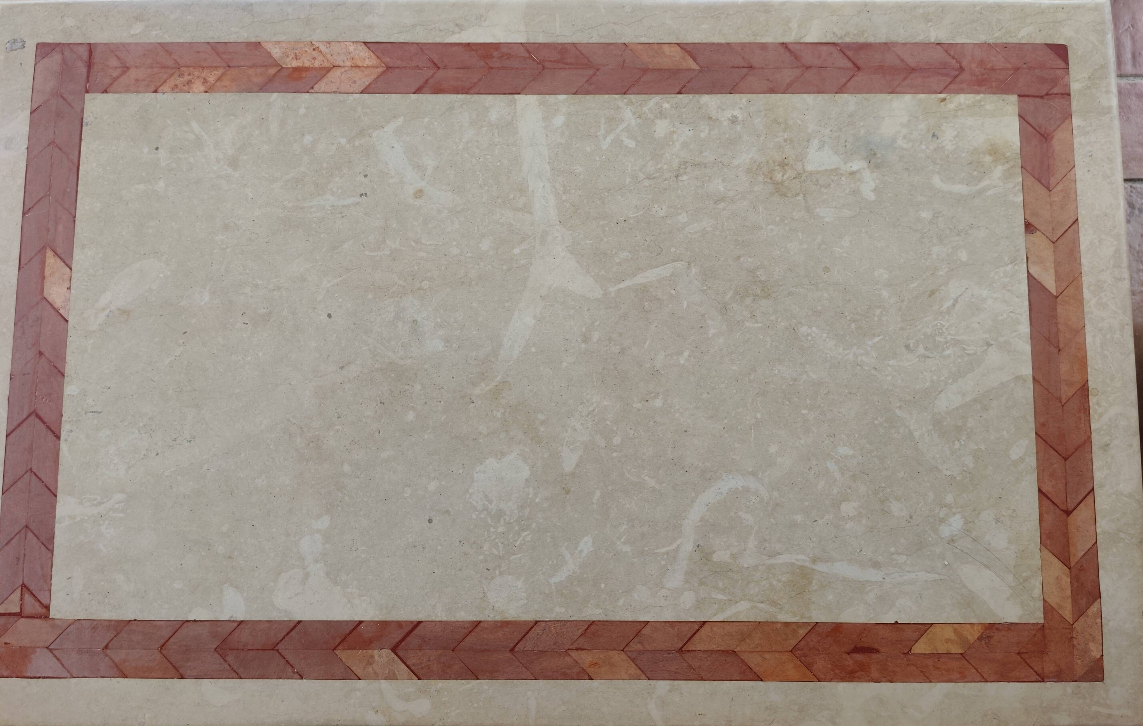 Character coffee table in stone marquetry and black metal.