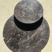 Brown petrified wood coffee table from Indonesia with a double circular top.