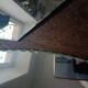 Three beveled mirrors