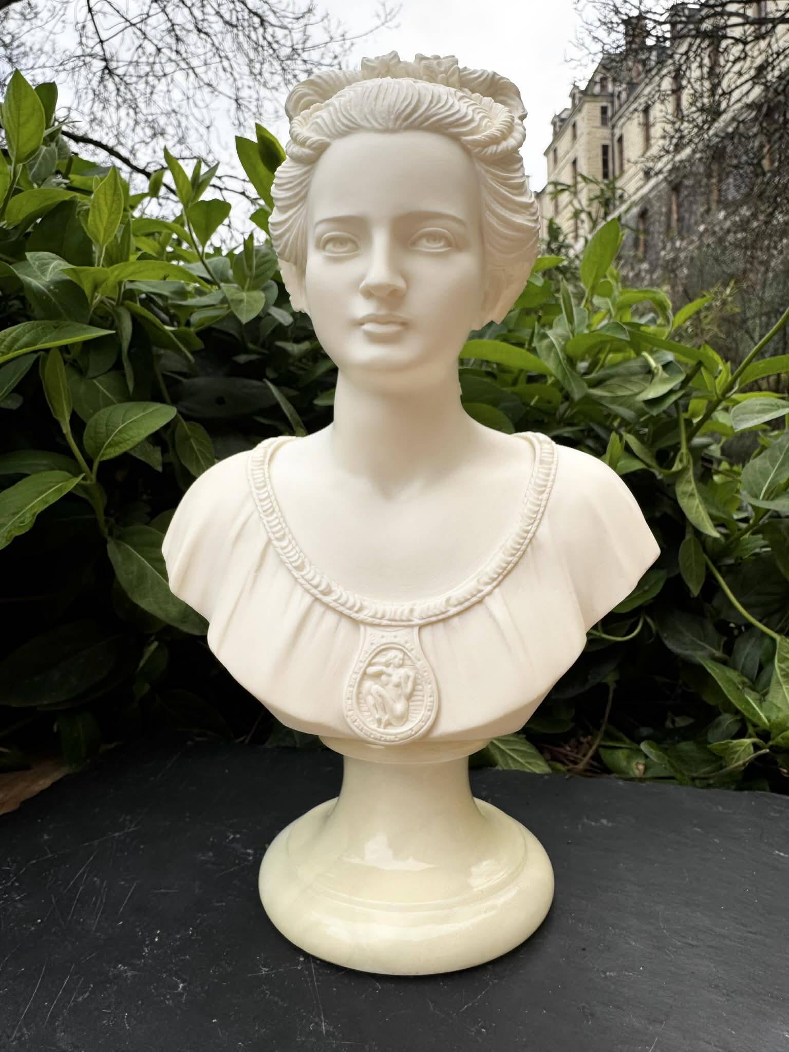 Alabaster bust of a woman signed Arnaldo Giannelli dated 1980.