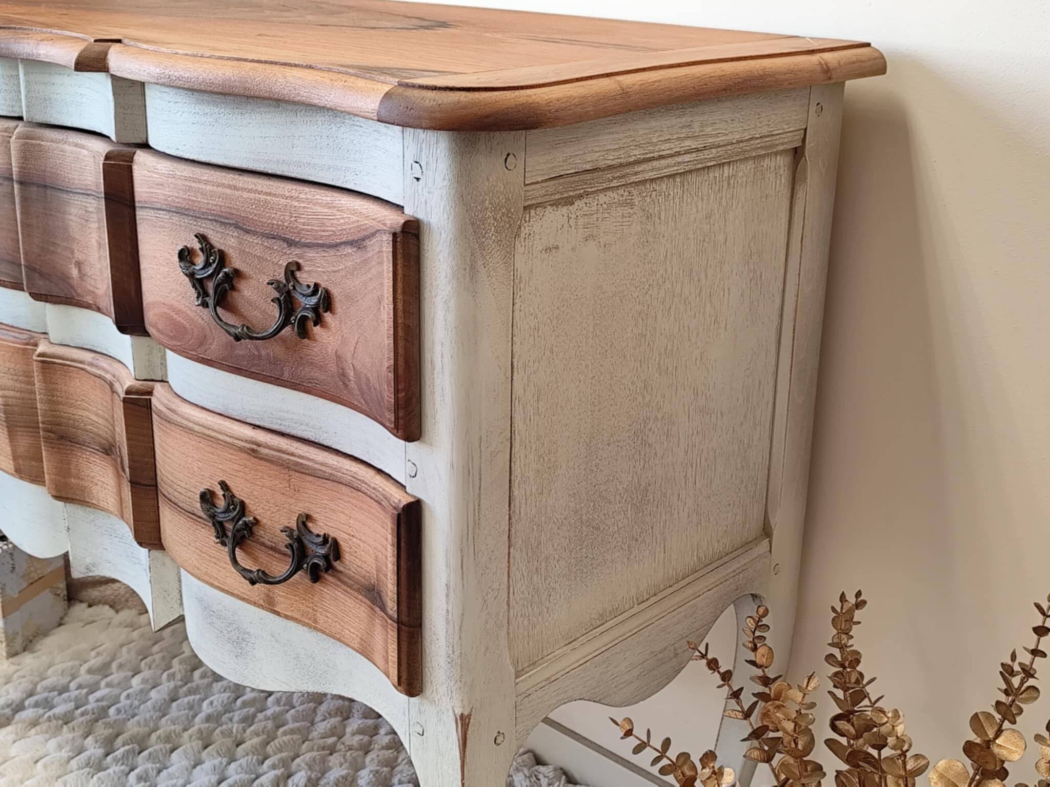 Walnut crossbow chest of drawers