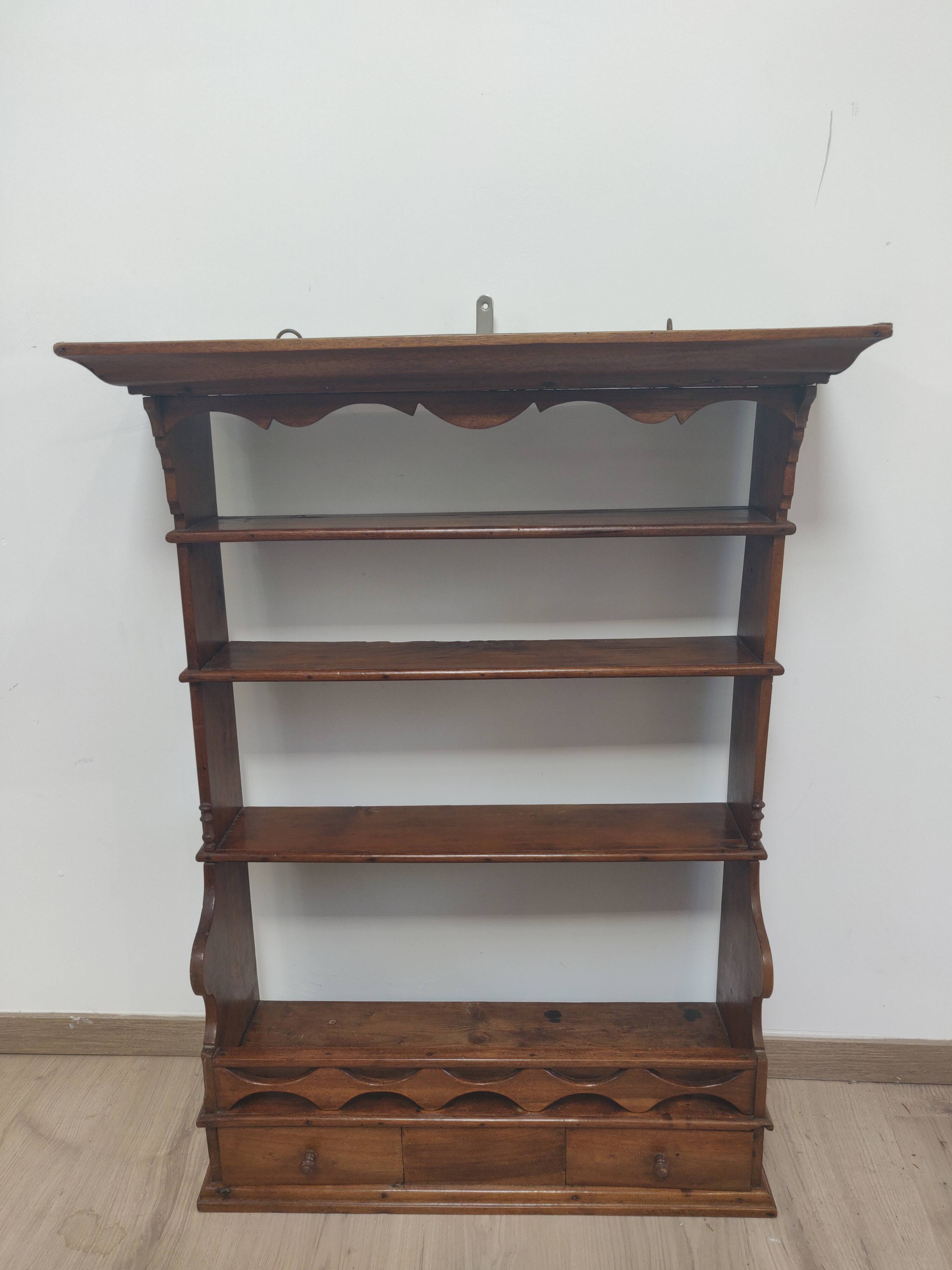 Wall shelf of the nineteenth century carved wood