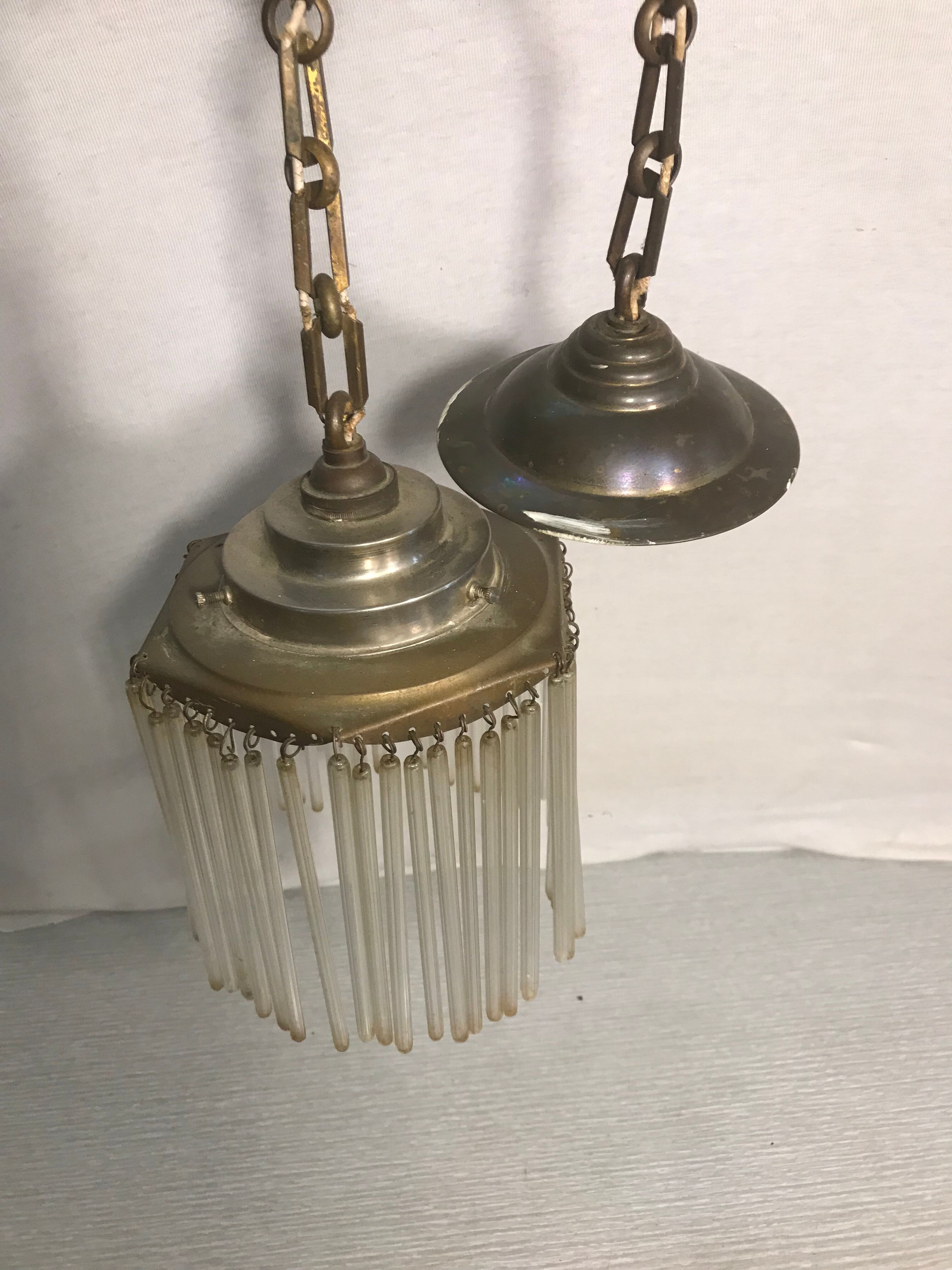 Old brass hanging cylindrical vintage glass pampilles