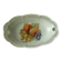 Pierced porcelain basket decorated with fruit still life.