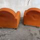 Pair of vintage orange club chairs