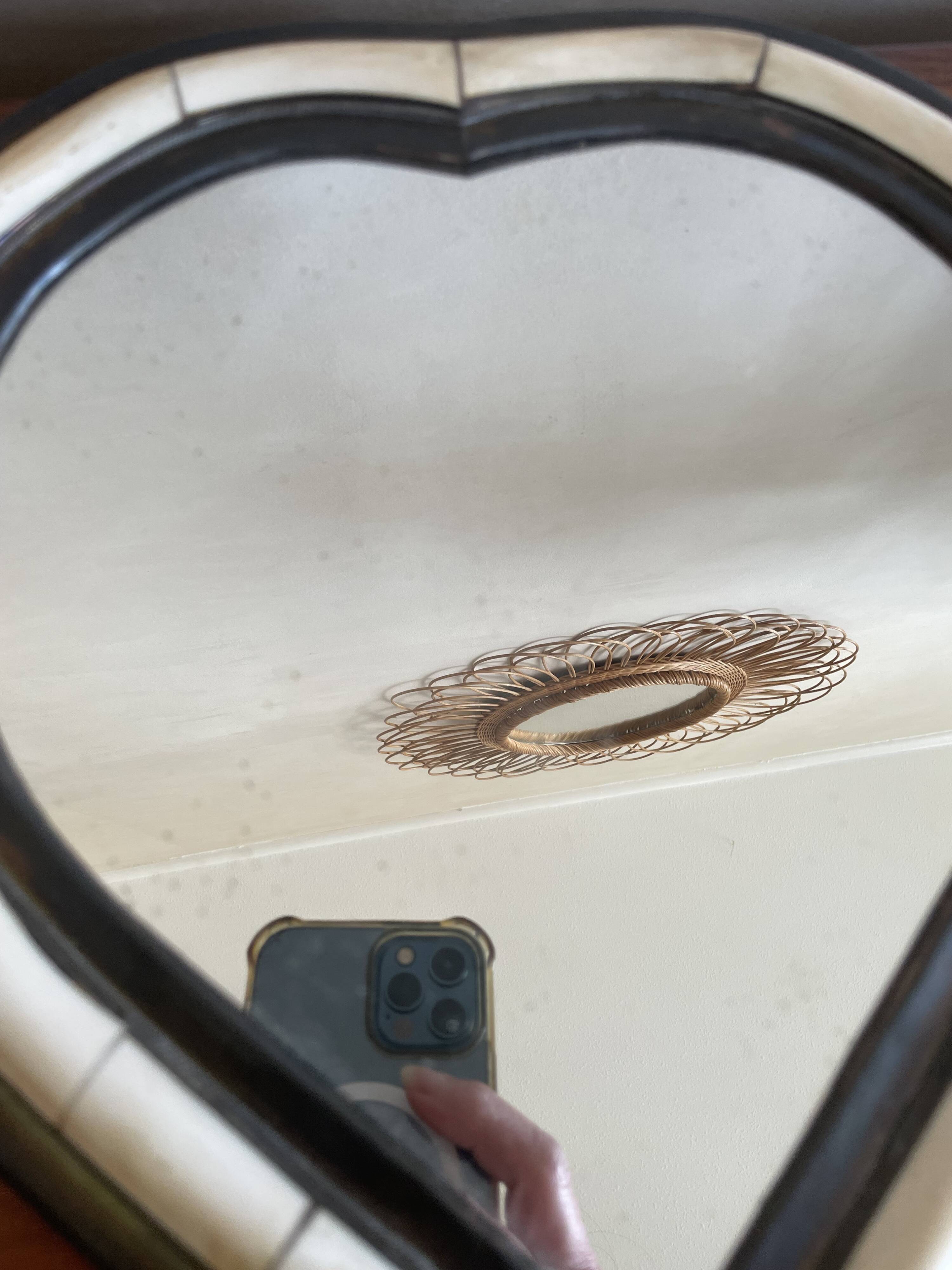 Heart-shaped bone and brass mirror