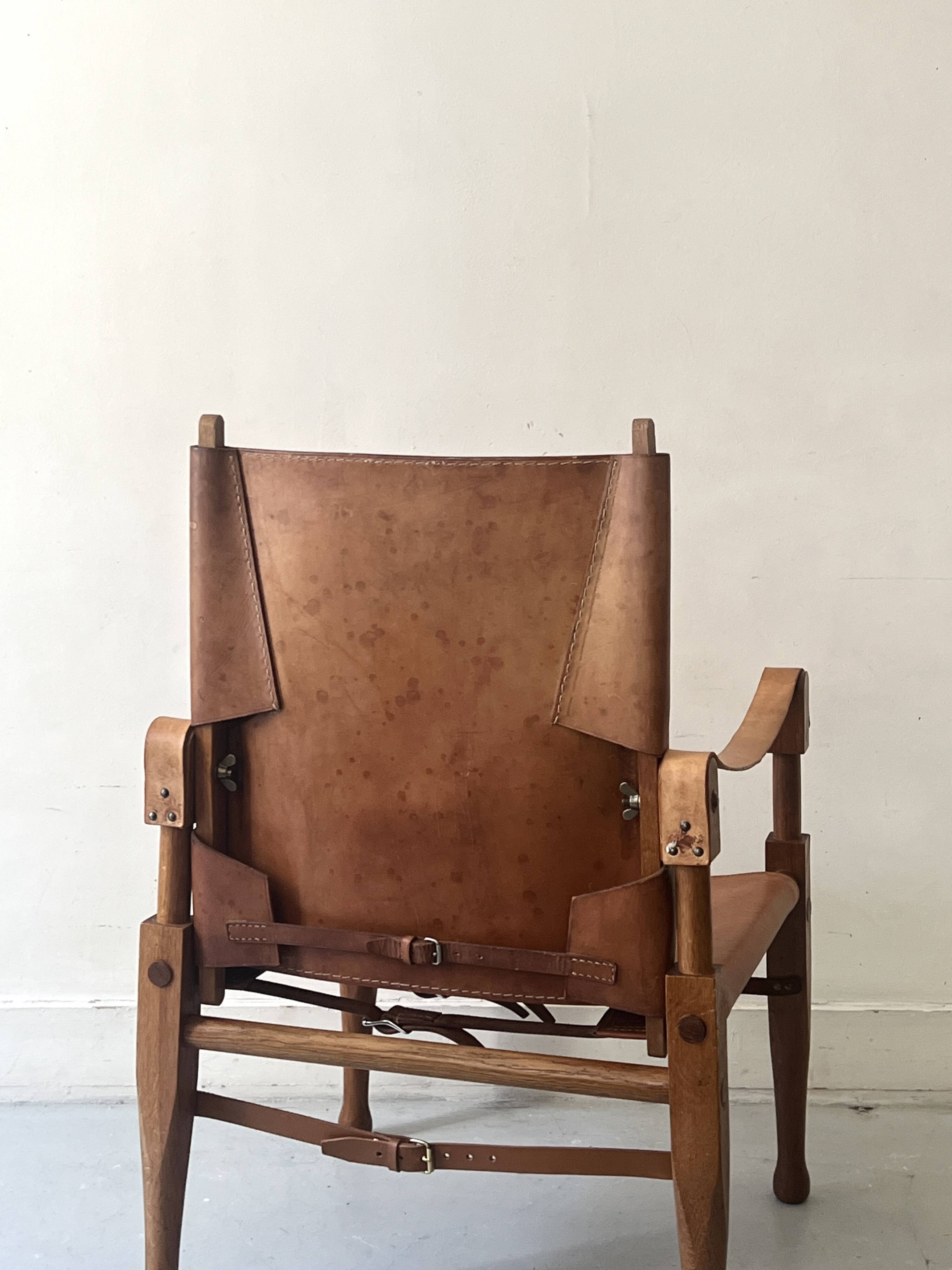 Safari armchair in wood & cognac leather by Wilhelm Kienzle for Wohnbedarf 1950