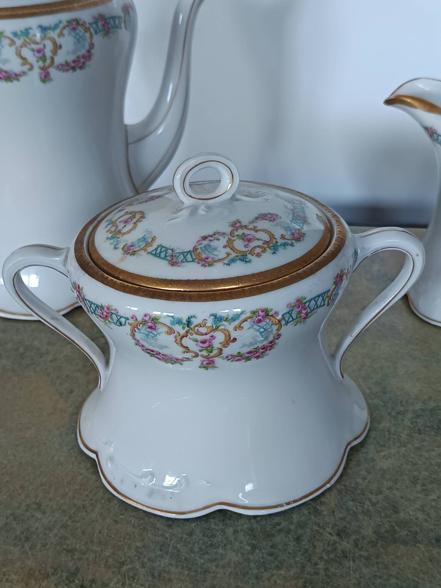 Limoges porcelain service – Lewis Straus & Sons – gold floral decoration