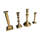 Set of 4 old candle holders in golden brass