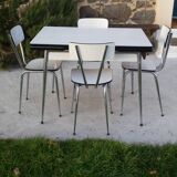 Table and 4 chairs in white formica