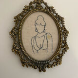 Broderie encadrée