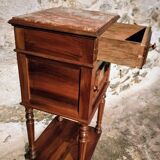 Antique French bedside table with a marble top.