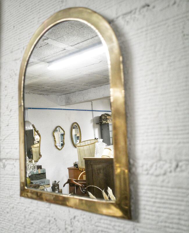 Brass half-moon mirror