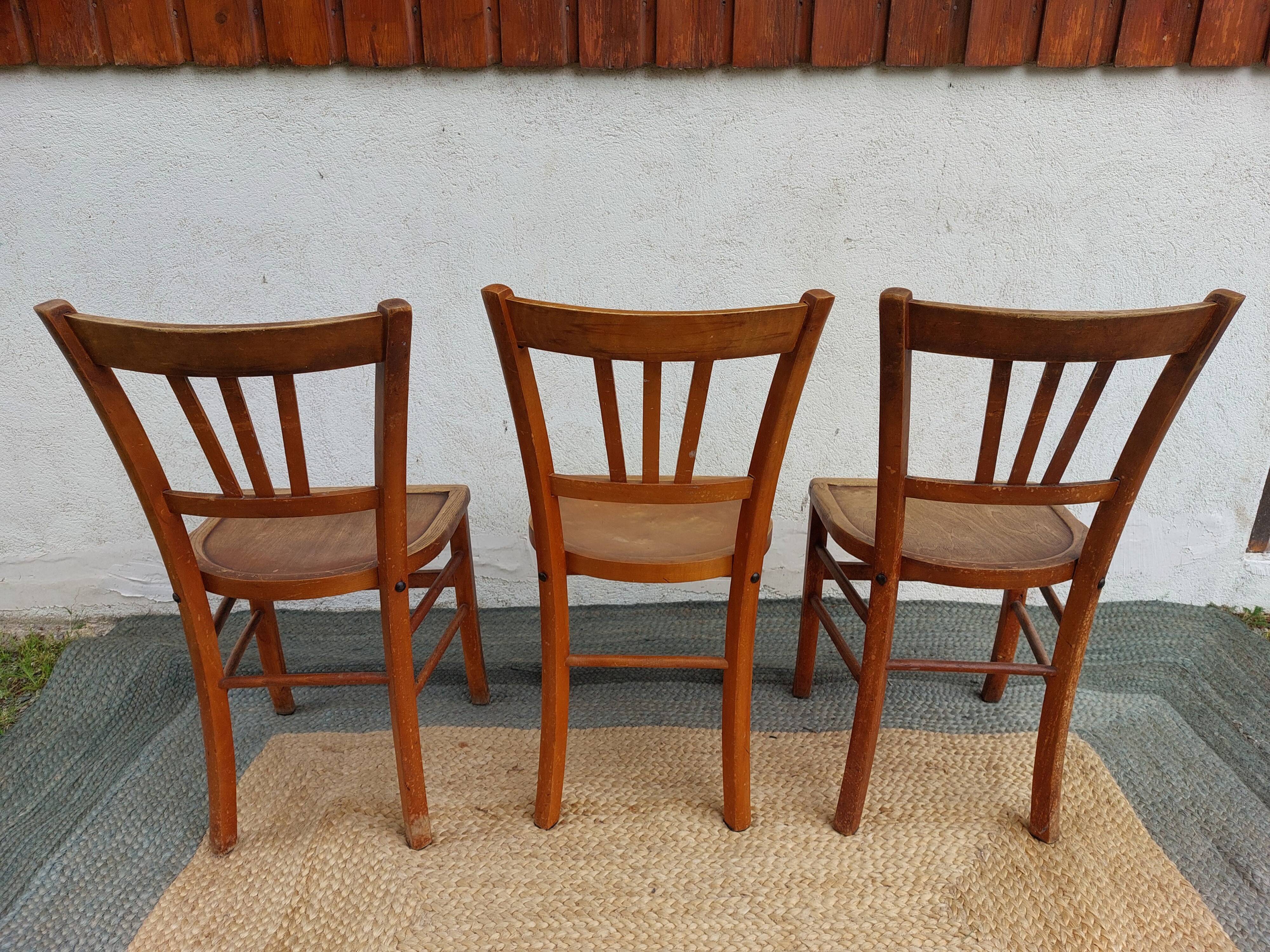 3 wooden bistro chairs