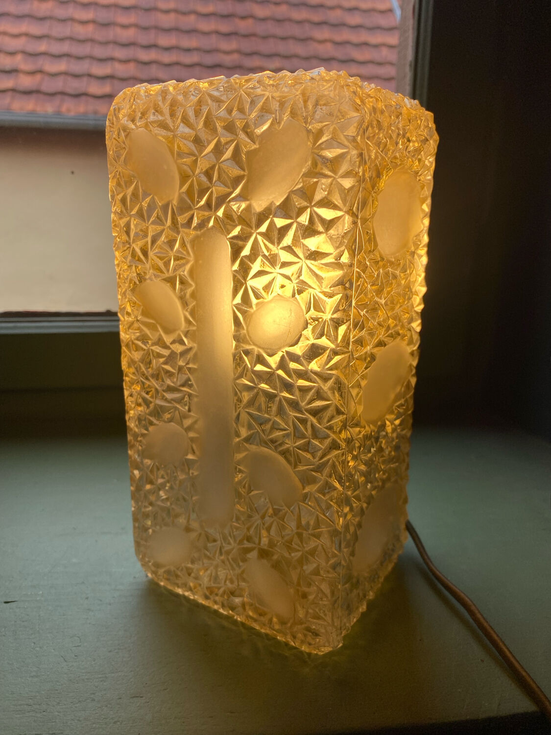Amber satin glass wall lamp from around 1970.