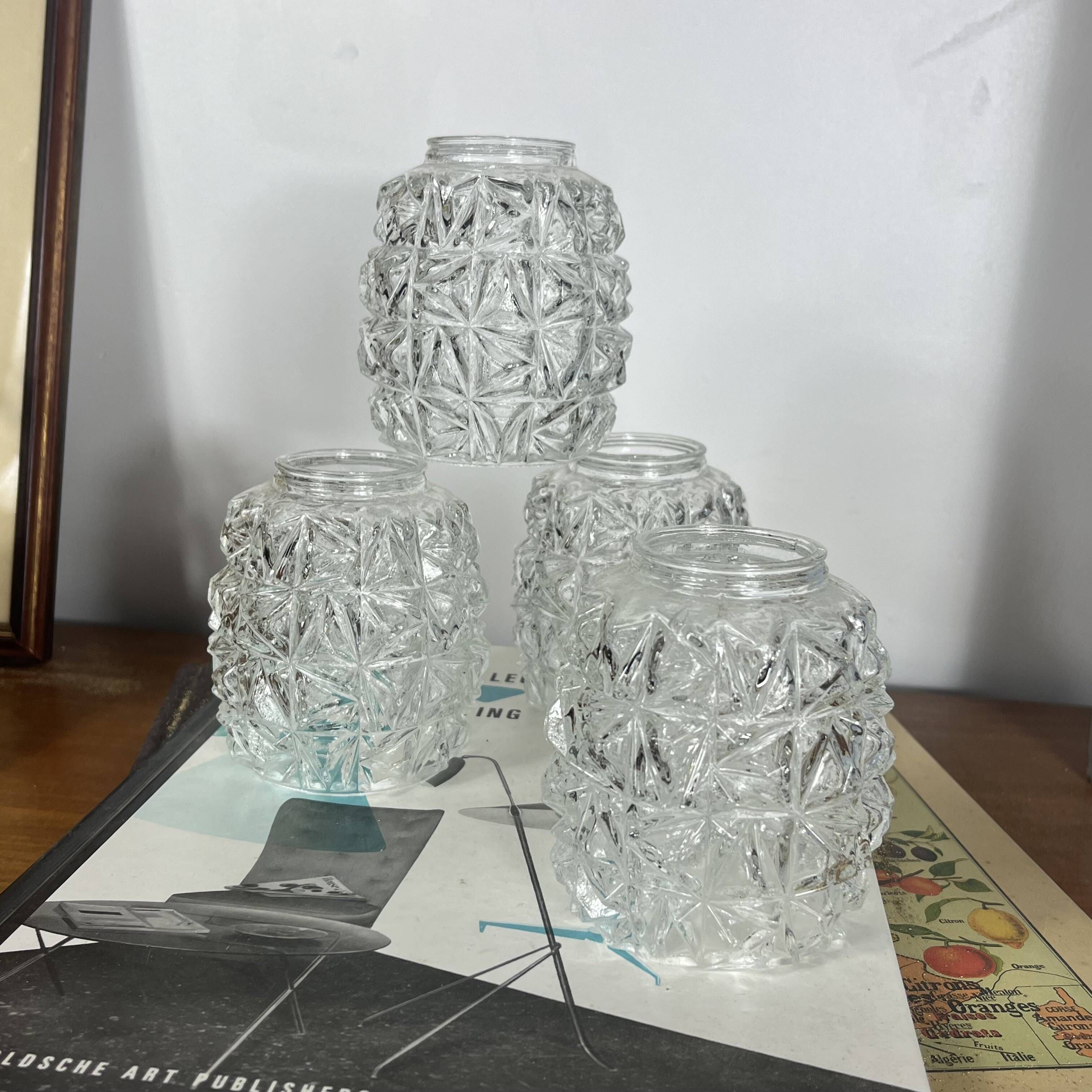 Set of 4 small vintage tulips in clear moulded glass.