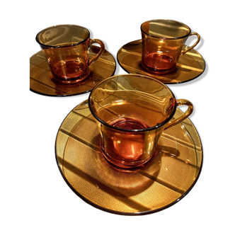 Set of 3 amber glass cups and saucers