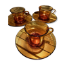 Set of 3 amber glass cups and saucers