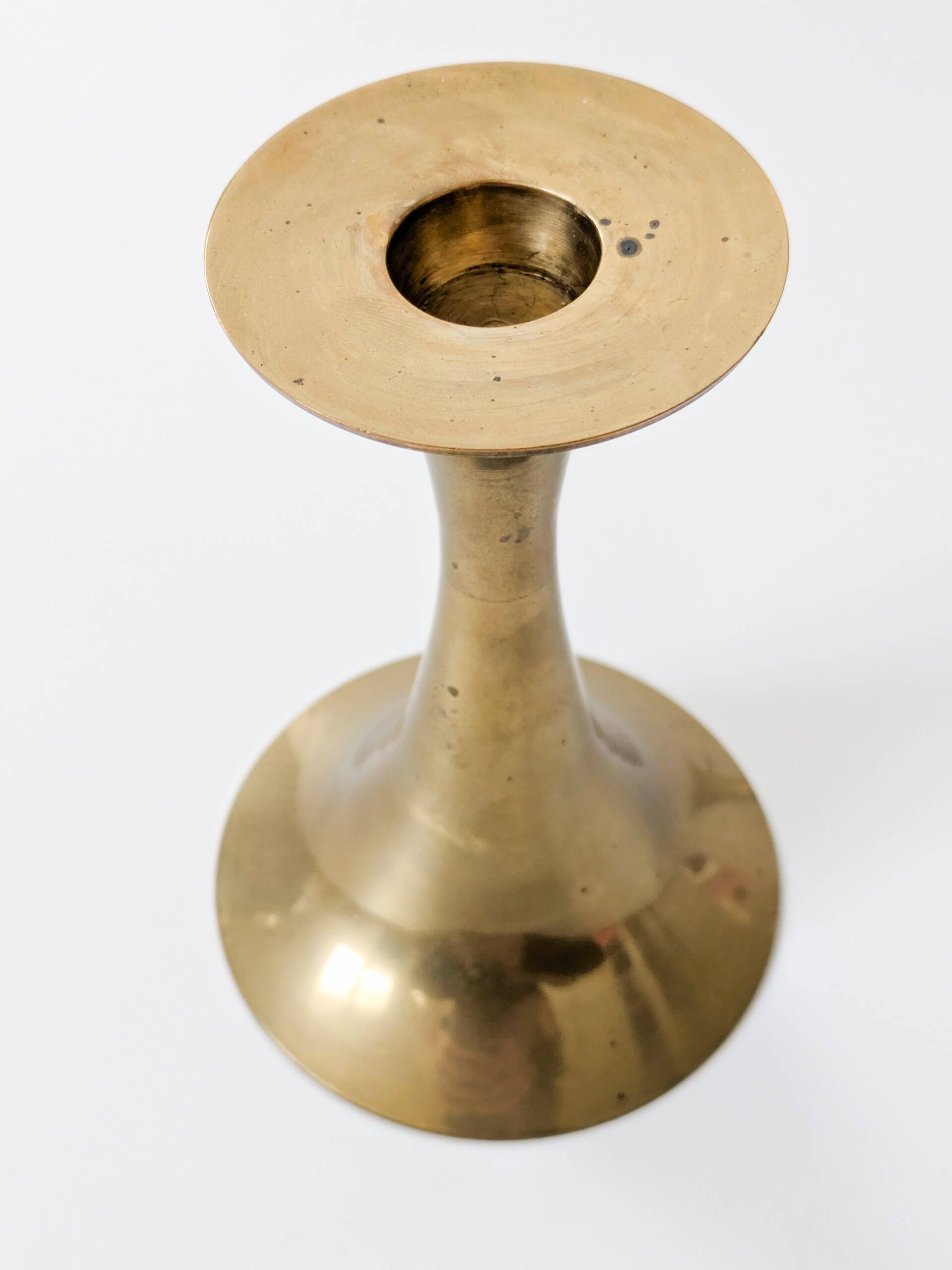 Pair of Midcentury brass candlesticks, flared shape.