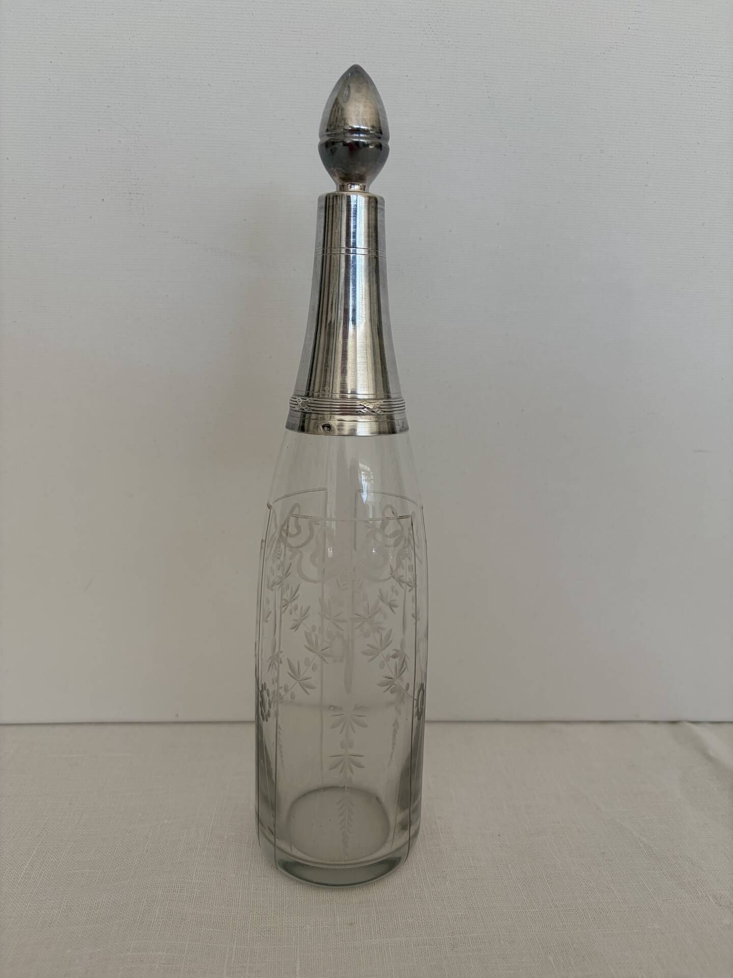 Cut glass and silver carafe