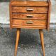 Scandinavian bedside table in oak from the 1960s with tapered legs and 3 drawers.