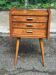 Scandinavian bedside table in oak from the 1960s with tapered legs and 3 drawers.