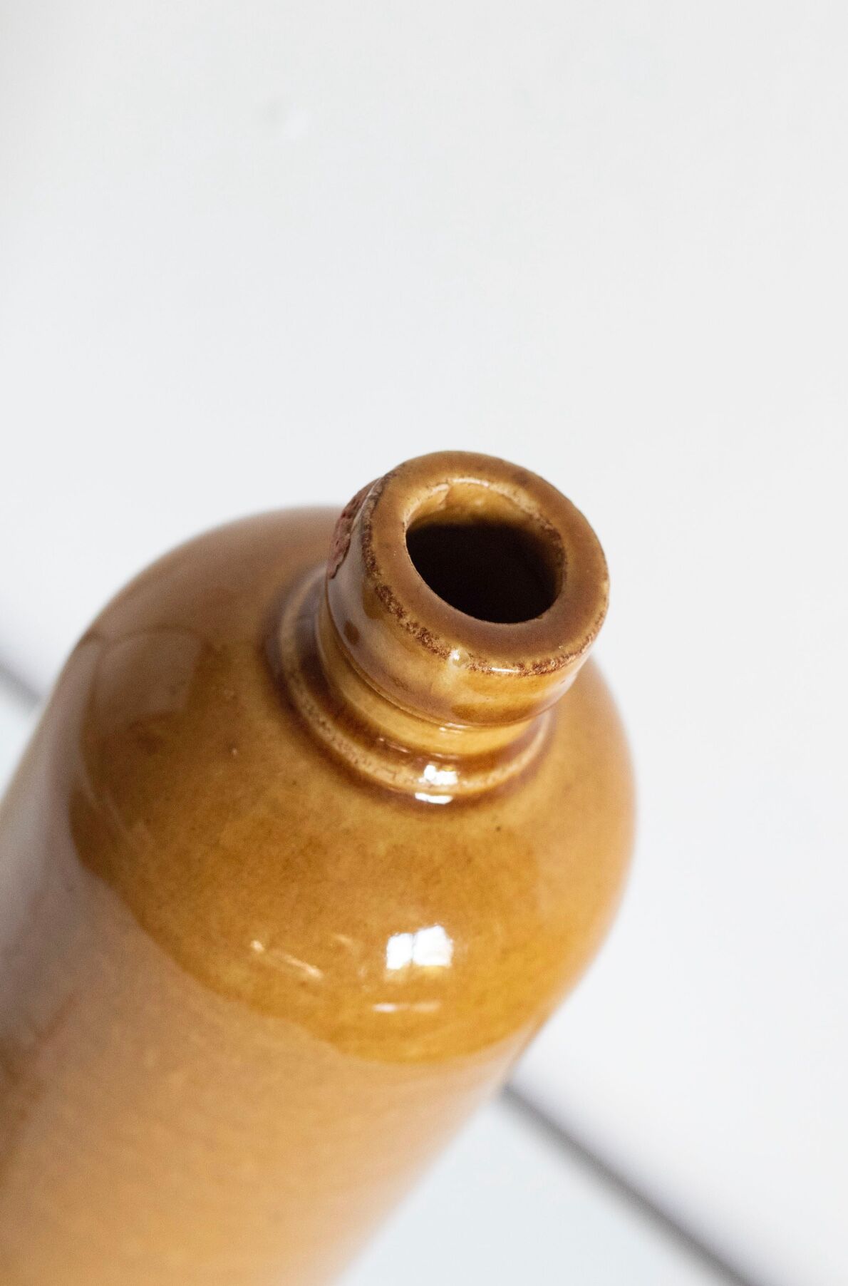 Enamelled stoneware bottle