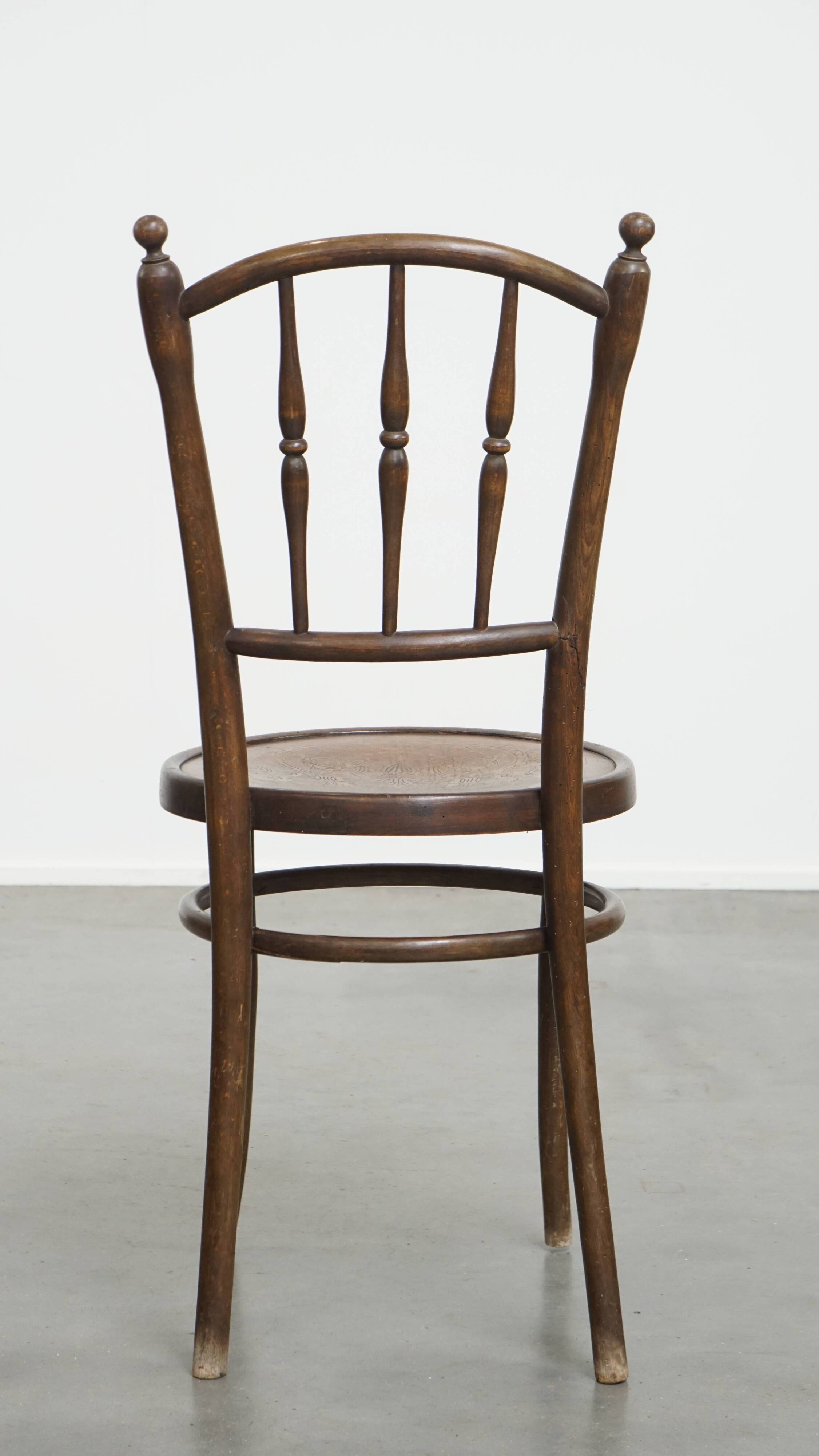 Bistro chair with carved seat