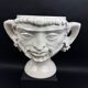 Large white earthenware flowerpot with faun heads circa 1900
