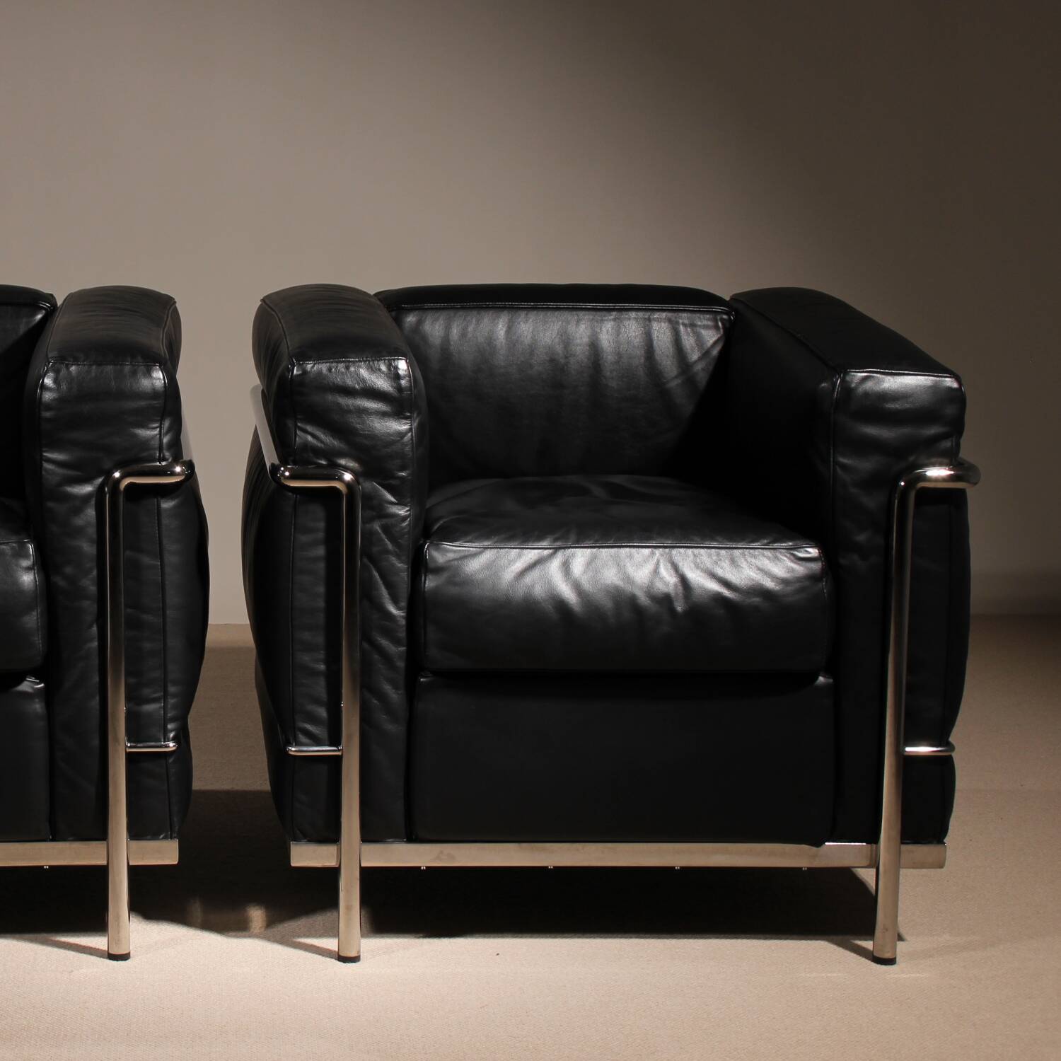 Two ‚LC2‘ Armchairs by Le Corbusier, P. Jeanneret, C. Perriand for Cassina