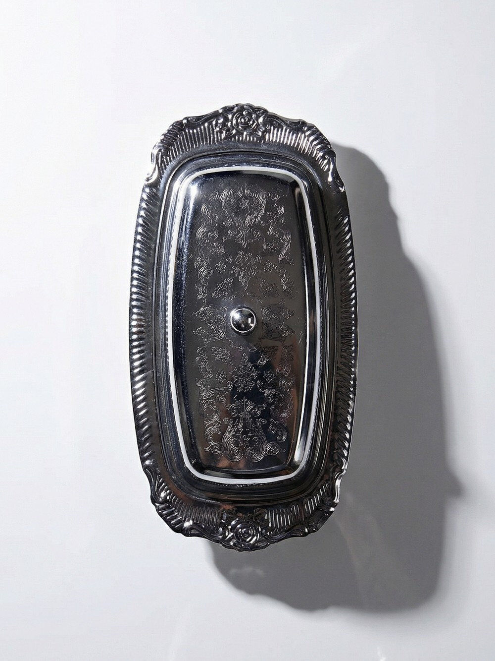 Silver-plated/inox vintage butter dish from the 1960s-1980s in Rococo style.