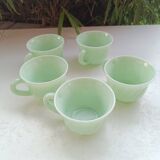 Set of green opaline cups