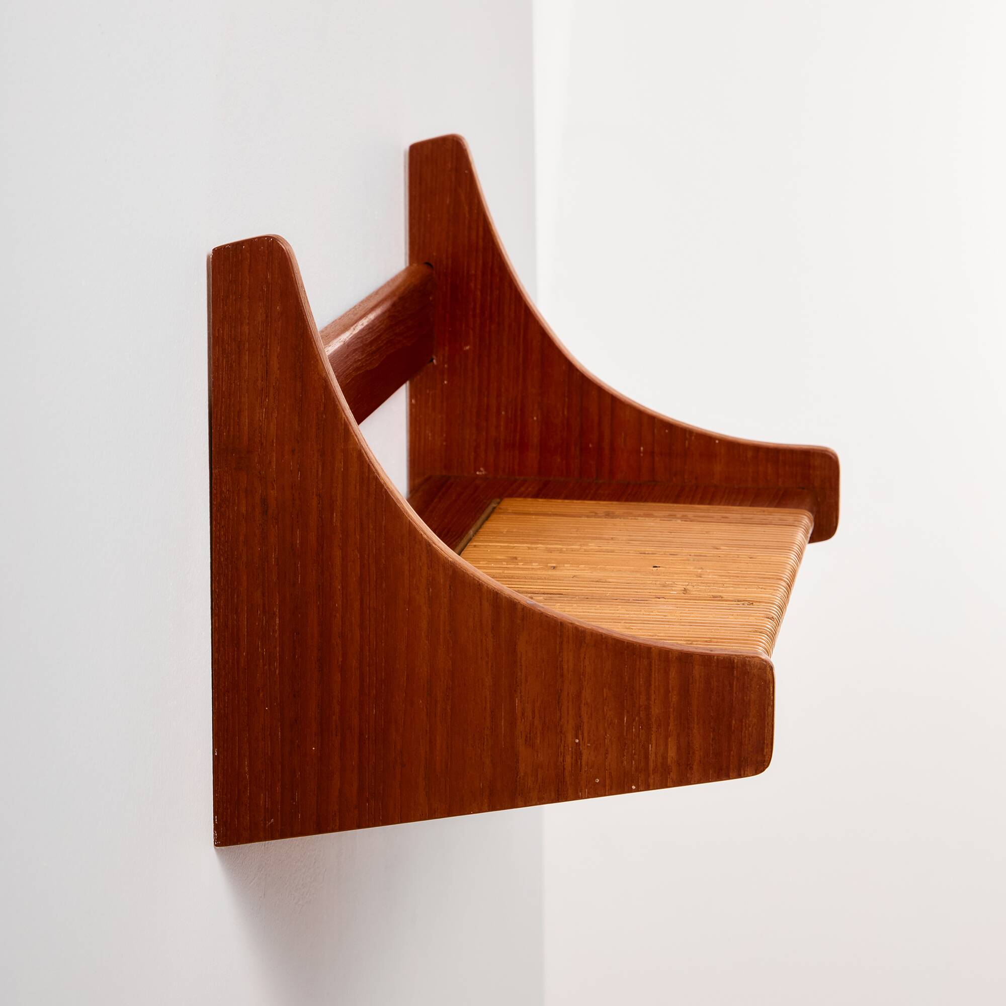 Teak wall shelf with cane details