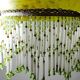 Antique Art Deco lampshade in yellow marbled glass with bead fringes.